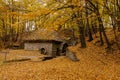 Beautiful old stone mill in the autumn season. Autumn landscape Royalty Free Stock Photo