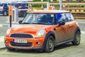 Beautiful old Morris Mini Cooper orange parked Royalty Free Stock Photo