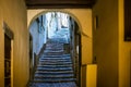 Beautiful old narrow stairs and arch on Italy street