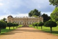 Beautiful old Orangery surrounded by lush manicured trees