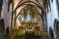 Beautiful old organ decorated by gold Royalty Free Stock Photo