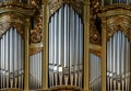 Beautiful old organ decorated by gold Royalty Free Stock Photo