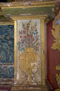 Old painted details in a historic Spanish church creating an interesting background in close-up