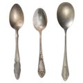 Beautiful old silver spoons isolated on white. Retro silverware Royalty Free Stock Photo
