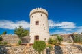 Beautiful old stone tower fortress in town of Cres, Kvarner, Croatia Royalty Free Stock Photo