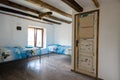 Beautiful old vintage country house - bedroom interior with wood beam ceiling and blue duvets and sheets Royalty Free Stock Photo