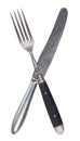 Beautiful old vintage crossed knife and fork isolated on white background. Top view. Retro silverware Royalty Free Stock Photo