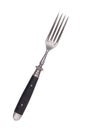 Beautiful old vintage fork isolated on white background. Top view. Retro silverware