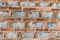 Beautiful old wall made of different bricks.