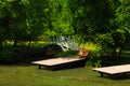 Beautiful old wooden bridge across the river Old wooden bridge across the pond, summer garden design Royalty Free Stock Photo