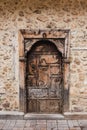 Beautiful old wooden brown door with handle in ancient city of Antalya Royalty Free Stock Photo