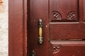 Beautiful old wooden brown door with handle in ancient city of Antalya Royalty Free Stock Photo