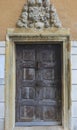 Beautiful old wooden door of the pilgrimage Church Maria Strassengel, a 14th century Gothic church in the town of Judendorf Royalty Free Stock Photo