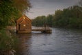 Beautiful old wooden mill on mura river or mlin na muri in the pomurje region of slovenia on a romantic summer sunset Royalty Free Stock Photo