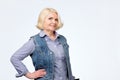 Beautiful older blonde woman smiling and standing Royalty Free Stock Photo