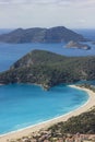 Beautiful oludeniz beach from cliff in mountains near mediterranean sea