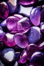 Beautiful opal stone pebbles background. Vertical background with purple stones, phone screensaver