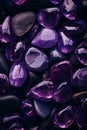 Beautiful opal stone pebbles background. Vertical background with purple stones, phone screensaver