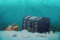 Beautiful opened empty old wooden treasure chest submerged under