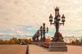 Beautiful openwork lamppost decorated with sculptures of a griffin on the square in the tourist complex Garibaldi Castle. The vill