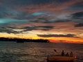 Beautiful orange blazing sunset view blue calm sea tropical with blue clouds over sky