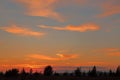 Beautiful orange bright sunset with blue sky and wonderful cloud