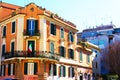 Beautiful orange building with Italian flag