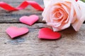 Beautiful Orange-Pink rose and deep red satin heart for Valentine& x27;s backdrop