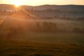 Beautiful orange sunrise and fog Royalty Free Stock Photo