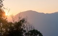 Beautiful orange sunrise over blue hills