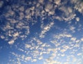 Beautiful orange sunset cloud formations on a deep blue sky Royalty Free Stock Photo