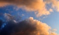 Beautiful orange sunset cloud formations on a deep blue sky Royalty Free Stock Photo