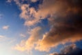 Beautiful orange sunset cloud formations on a deep blue sky Royalty Free Stock Photo