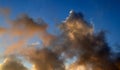 Beautiful orange sunset cloud formations on a deep blue sky Royalty Free Stock Photo