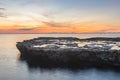 Lovely orange sunset and idyllic water surface in the sea Royalty Free Stock Photo