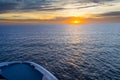 Beautiful Orange Sunset in the Ocean captured from a ferry deck between Denmark, and Faroe Islands