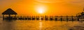 Beautiful orange sunset on the sea with a pier Royalty Free Stock Photo