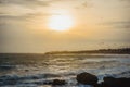 Beautiful orange sunset and sky with clouds over the Indian Ocean Royalty Free Stock Photo