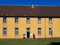 Beautiful orangery at the castle Schloss Benrath in Duesseldorf in Germany with a big park and white sculptures