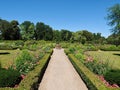 Beautiful orangery at the castle Schloss Benrath in Duesseldorf in Germany with a big park and white sculptures