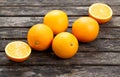 Beautiful Oranges Fruit Full and Sliced on old wooden table. rich with vitamins. background, texture. Royalty Free Stock Photo