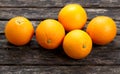 Beautiful Oranges Fruit on old wooden table. rich with vitamins. background, texture Royalty Free Stock Photo