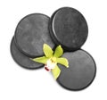 Beautiful orchid flower and spa stones on white background Royalty Free Stock Photo