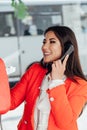 beautiful oriental brunette woman talking on street phone Royalty Free Stock Photo