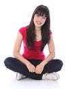 Beautiful oriental teenager girl cross legged Royalty Free Stock Photo