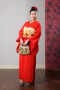 Beautiful oriental woman in red japanese kimono Royalty Free Stock Photo