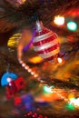 Beautiful original toy whirligig on Christmas tree close-up Royalty Free Stock Photo