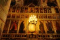 Beautiful ornate painted interior of Orthodox Church. Old frescoes with icons inside luxury Russian cathedral. Moscow