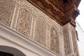 Beautiful ornate relief at a facade of a madrasa in Fes, a Koran school