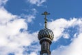 Beautiful Orthodox church dome with a cross on a background of the cloudy sky. Royalty Free Stock Photo